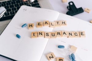 Letters on book spelling Health Insurance